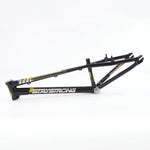 A Staystrong V4 Frame Expert XL Cruiser in black, featuring yellow accents and the words "STAY STRONG" written on the side, is shown against a white background.