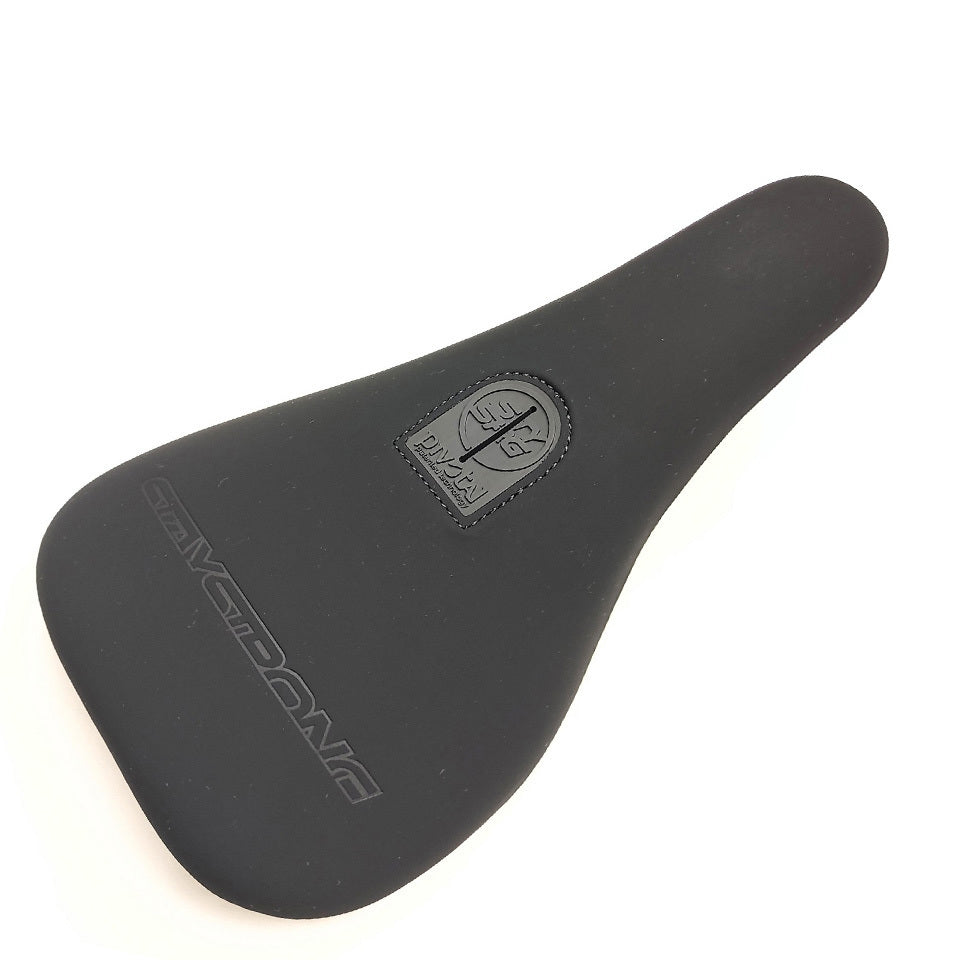 The Stay Strong Cut Off Slim Pivotal Seat features a black microfibre construction and branded logo, offering cyclists a smooth and minimalist design that perfectly captures the Stay Strong ethos for those who prioritize both comfort and style.