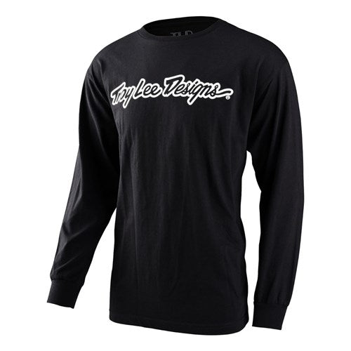 The TLD 25 Signature LS Shirt is a black long-sleeve shirt with a simple design, showcasing "Troy Lee Designs" elegantly printed in white script on the front.