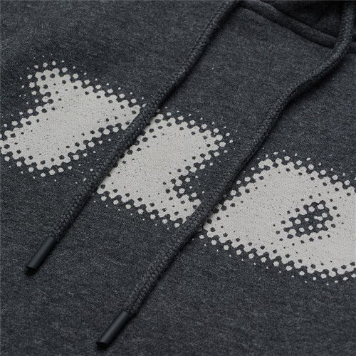 Close-up of the TLD 25.1 Stamp Hoodie in dark gray, ideal for winter, featuring black drawstrings and white pixelated letters.