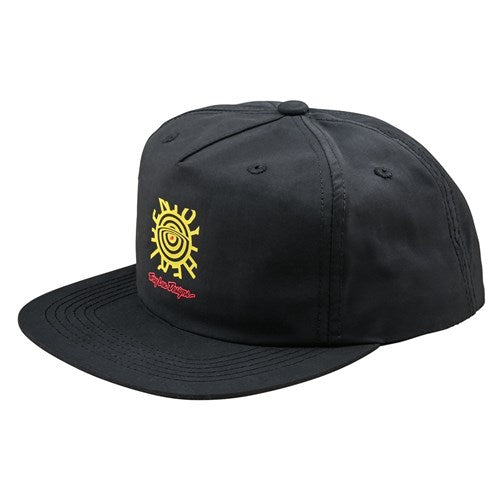 The TLD 25.1 Enjoy Unstructured Hat is a black baseball cap adorned with a front design of a yellow sun and an eye, highlighted by bold red text beneath the design.