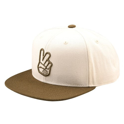 The TLD 25.1 Peace Hat radiates a classic style with its beige color, brown brim, and an embroidered peace sign hand on the front.