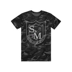 The S & M Big Shield T-Shirt is available in an oversized fit and features a camouflage pattern with an eye-catching crest design. The front print prominently displays "S&M" and "AMERICAN BICYCLE CO." in bold letters, and it's made from 100% combed ring-spun cotton for maximum comfort and style.