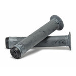 Two Eclat Bruno Grips, featuring a ribbed texture in gray with black ends, are arranged in a crossed formation.