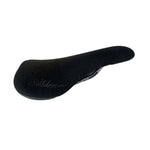 The Fit Bike Co Microfibre Railed Seat is a black bicycle saddle with a side embossed logo and durable microfiber cover, ideal for those valuing comfort and style.