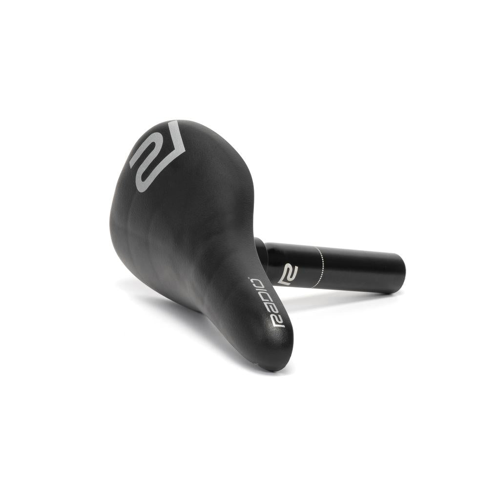 The Radio Raceline Seat & Post Combo is a sleek black bicycle saddle with a silver logo on a white background, showcasing a lightweight seat design.