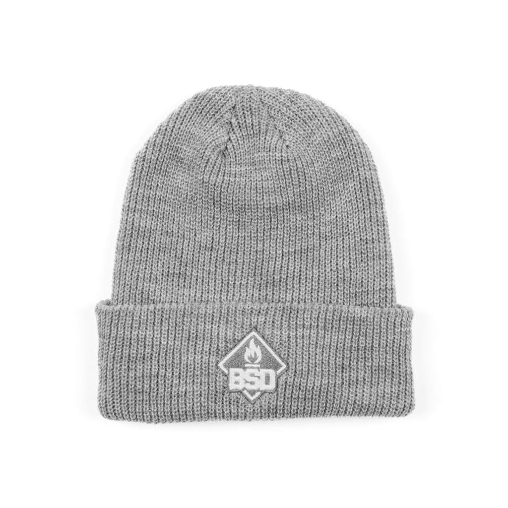 The BSD Roastin Beanie, in gray hypoallergenic acrylic, showcases an embroidered "BSD" logo and flame design on the fold.