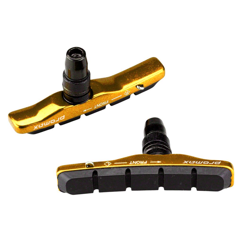 Two Promax B-1 Cartridge Brake Pads, gold in color with "Promax" branding and featuring black rubber contact surfaces, are displayed on a white background. Ideal for V-brake pad sets and Linear Pull systems.