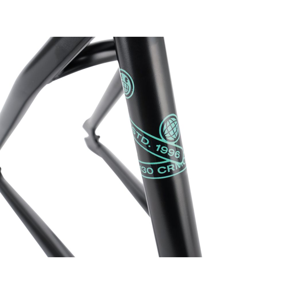 Close-up of the robust Wethepeople Trigger Frame in black, featuring teal decals with "ESTD. 1996" and "30 Crew." Expertly designed for the WTP AM team, its versatile geometry guarantees a smooth ride while exuding timeless style.