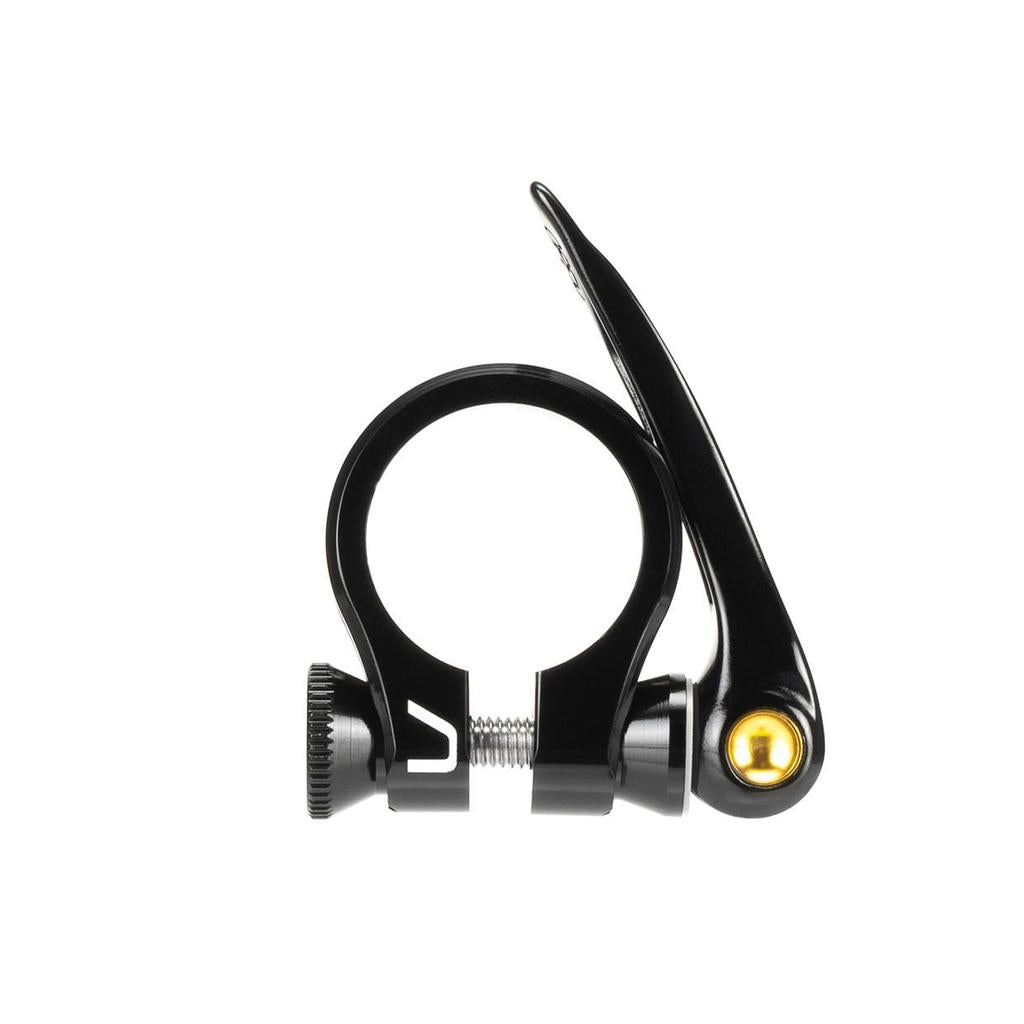 The Arise Ozon Seat Post Clamp is a black CNC machined clamp featuring a quick-release lever with gold accents, available in 25.4mm or 31.8mm sizes—perfect for BMX race bikes.