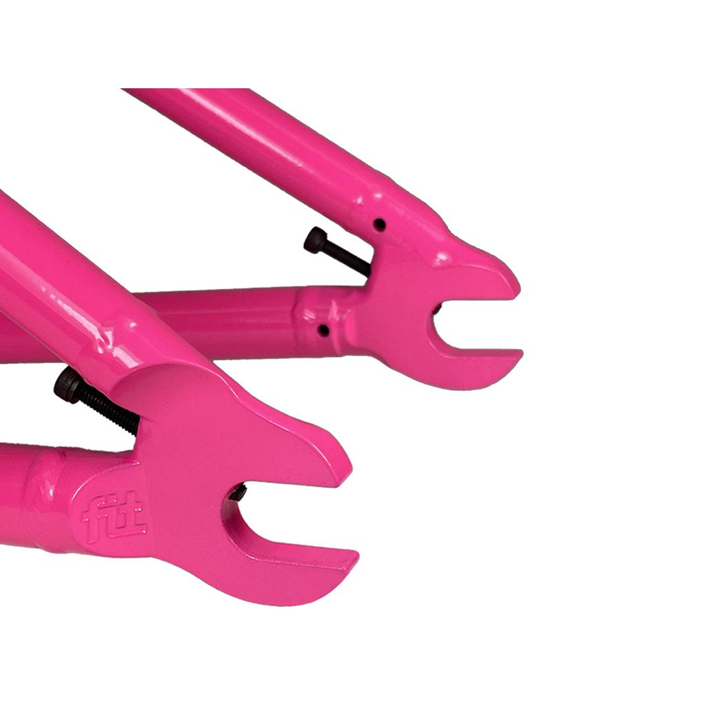 Close-up of two pink dropouts with bolts on the Fit Bike Co Shortcut V2 Frame, crafted for agile BMX riders.