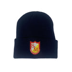 The S&M Ribbed Cuffed Beanie is a black knit hat with a hypoallergenic design, featuring an elegantly embroidered red and yellow shield emblem with "S M" next to "American Encyclopedia" on the front.