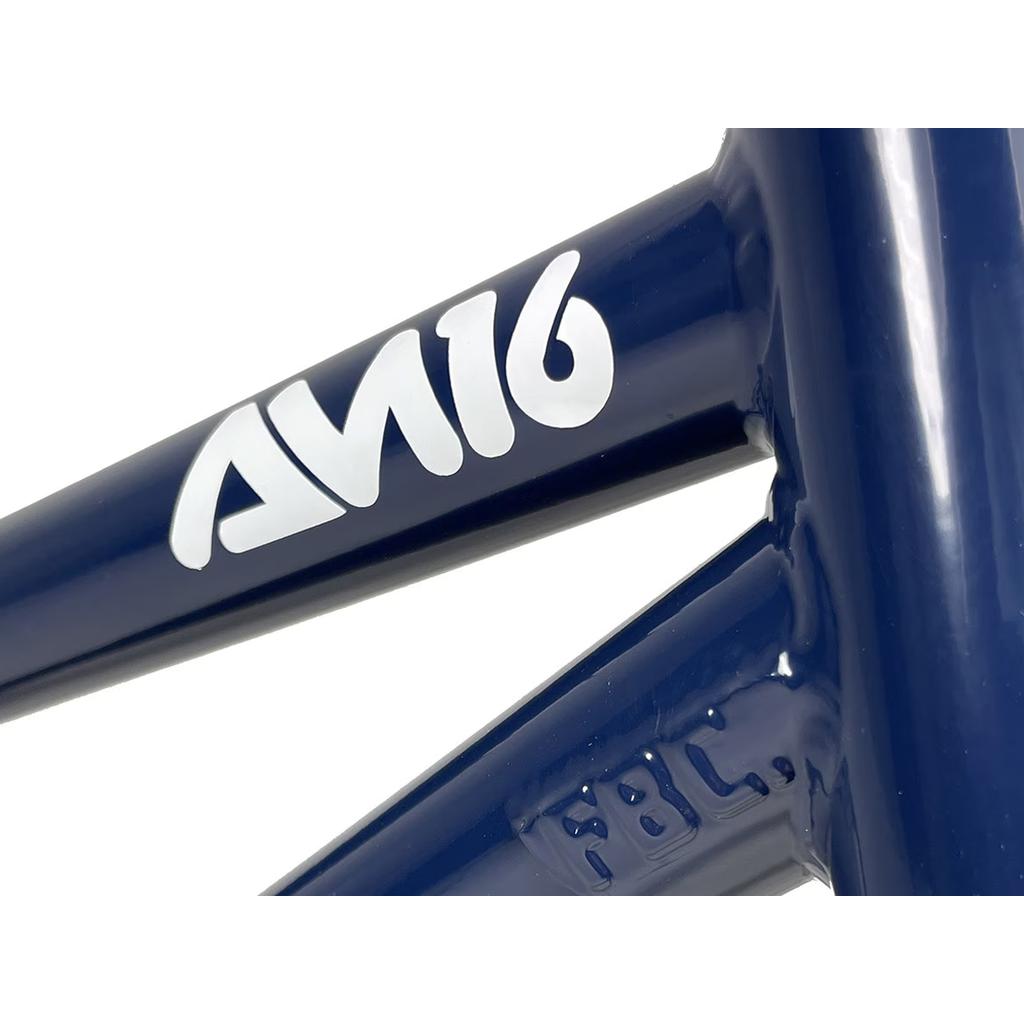 The Fit Bike Co AM 16 Frame & Fork Kit features a close-up of a blue metallic bicycle frame with a white "AW16" logo, ideal for young shredders.