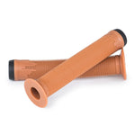 Two brand new Eclat Bruno Grips in orange, featuring ribbed design and black ends, are crossed and placed on a white background to showcase their quality.