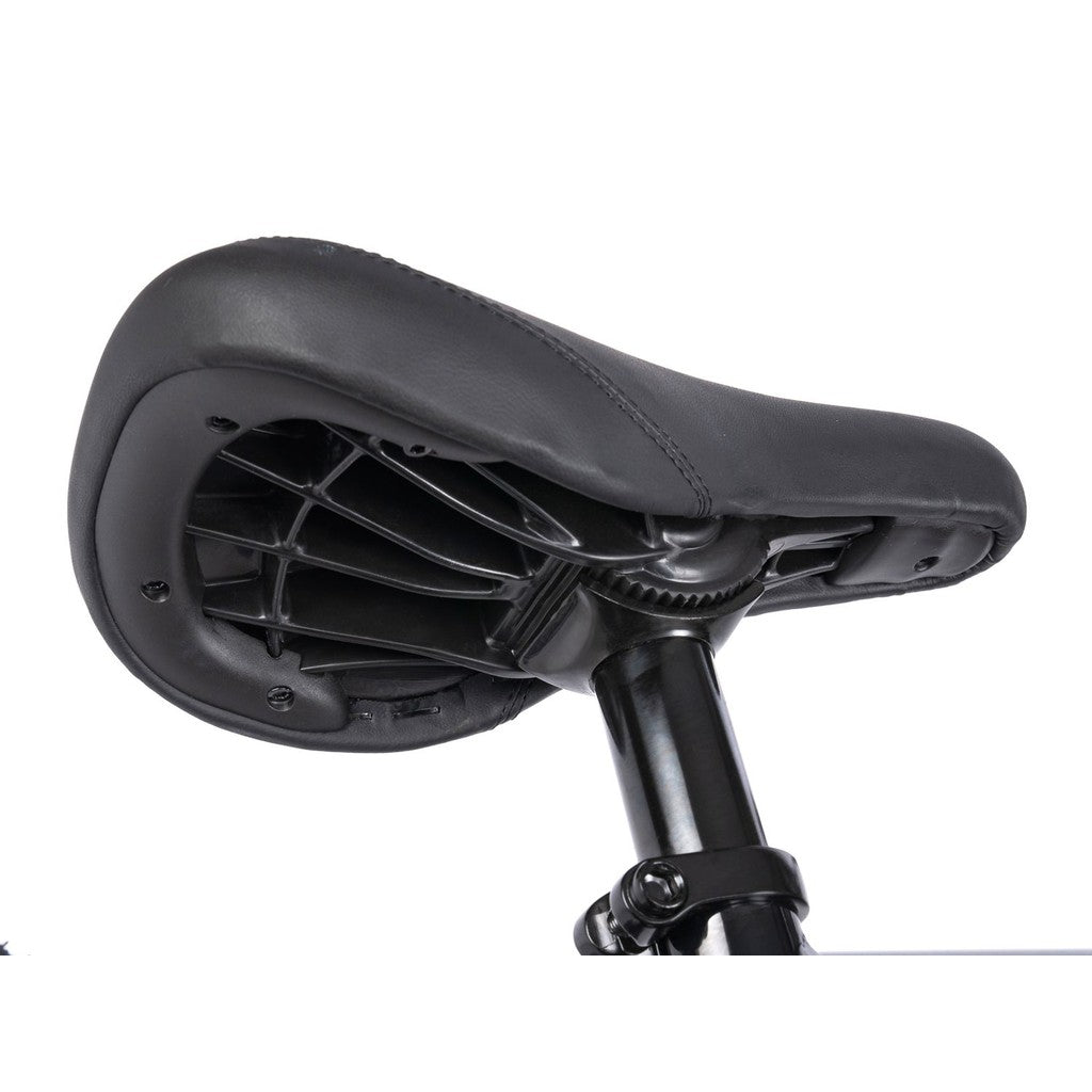 Close-up of the black bicycle saddle with a visible support structure, mounted on the seat post of the sleek Wethepeople CRS FS 18 Inch BMX Bike.