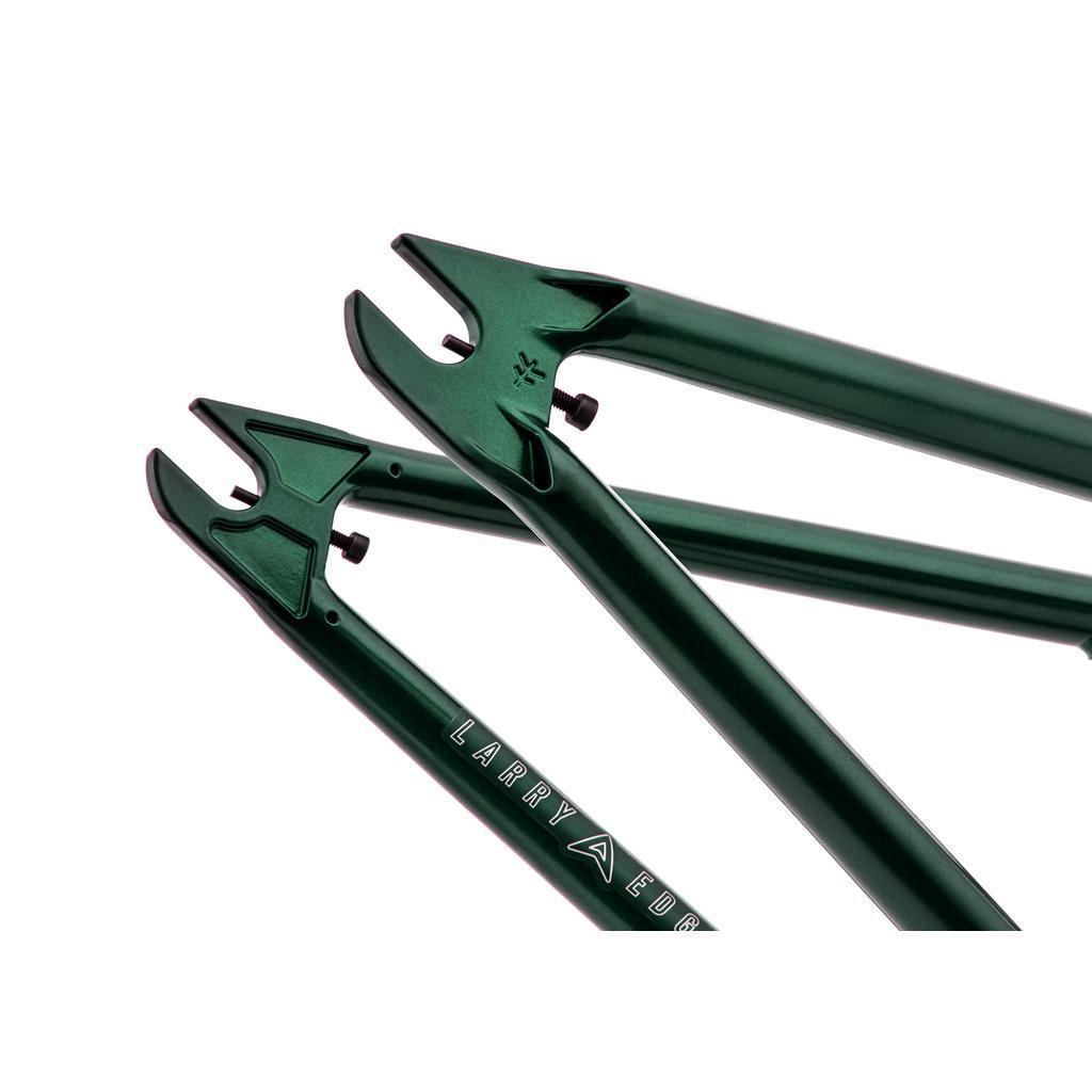 Close-up of metallic green 4130 Cr-Mo fork dropouts with "LARRY" and logo engraved, perfectly complementing your Fly Aire Frame.