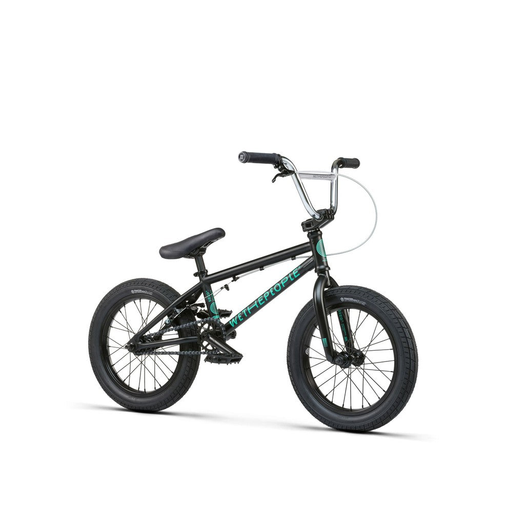 The Wethepeople Seed 16 Inch Bike is a black BMX shredder with green accents. It features a sturdy frame, knobby tires, a padded seat, high handlebars for thrilling rides, and Salt Rookie Cranks for smooth pedaling.