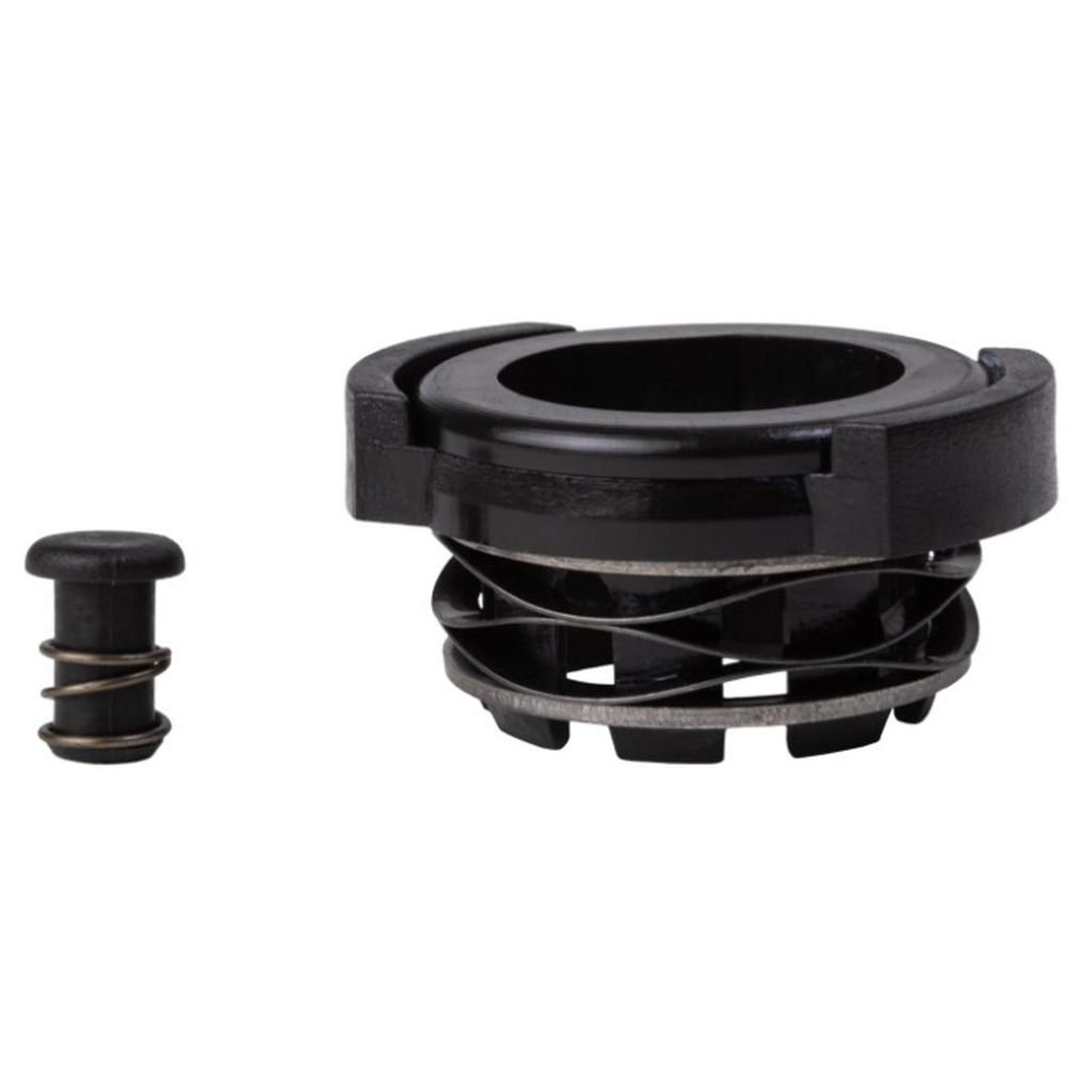 The Odyssey Clutch Pro Drag Mech, a black mechanical component with a coiled spring designed to be a replacement drag mechanism, is paired alongside a smaller black cylindrical piece.