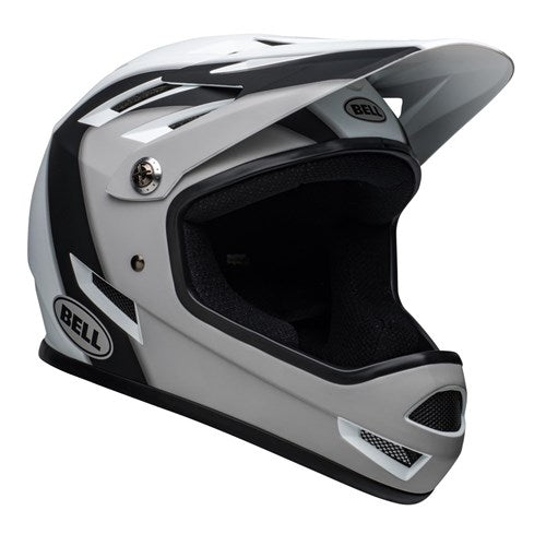 A matte black and white Bell Sanction Presence full-face BMX race helmet with a visor and ventilation slots.