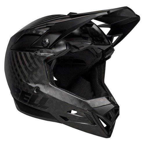 A Bell Full-10 SPHR MIPS Matte Black, full-face motocross helmet with a visor and ventilation openings, featuring a sleek design with subtle pattern detailing and advanced helmet safety technology.