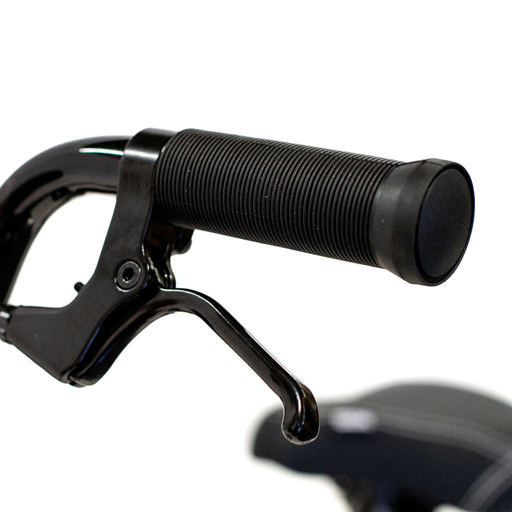 Close-up of the Colony Horizon 14 Inch Bike's black handlebar, featuring a textured rubber grip and an attached brake lever, designed to be compatible with lightweight alloy frames. Perfect for BMX bikes inspired by Freestyle Olympic athletes.