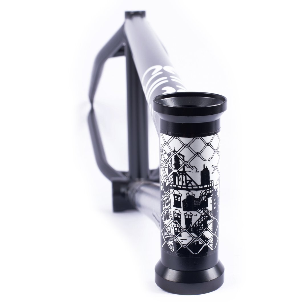 The Cult Dehart Frame, a Chase Dehart signature BMX frame, features striking white graffiti art depicting a cityscape and fence design on the head tube against a sleek white background.