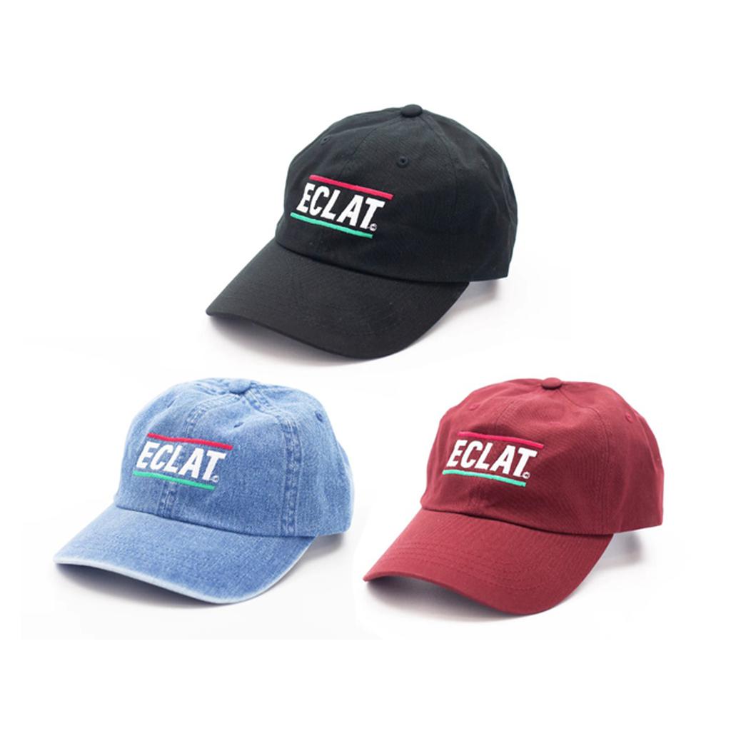 Three Eclat Pizza Place Caps are showcased: classic black, denim blue, and rich maroon. Each cap features "ÉCLAT" embroidered on the front, making them ideal for casual outings or a visit to a trendy pizza spot.