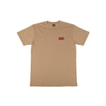 A tan-colored BSD We Here Forever Tee with short sleeves and a small red "BSD" logo on the left chest area, displayed on a plain background.