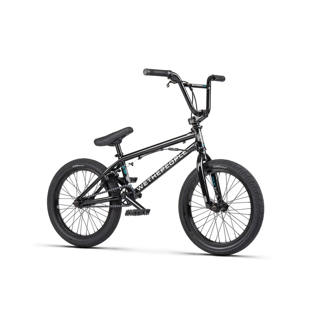 The Wethepeople CRS FS 18 Inch BMX bike, in black, showcases thick tires, a sturdy frame, and high handlebars against a white background.