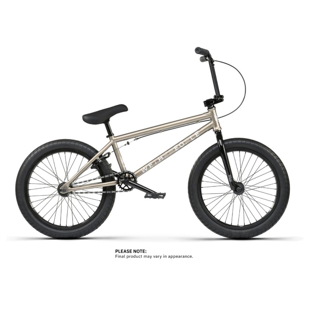 The Wethepeople Arcade 20 Inch BMX Bike, a silver model with Salt Am Cranks, Salt Valon Rims, and black handlebars, pedals, and wheels, is showcased on a white background. Text below indicates the final product may vary in appearance.