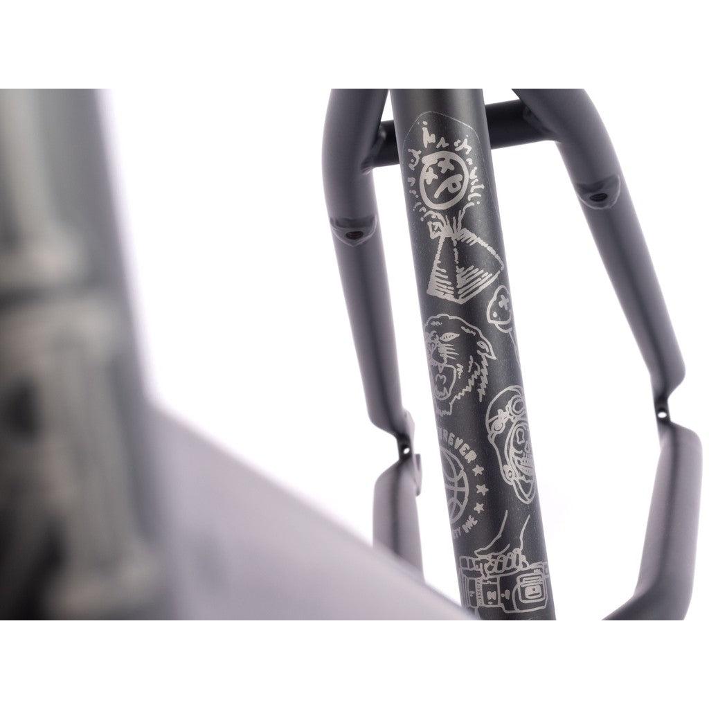 Close-up of David Grant's Signature BSD Raider V3 Frame (2022) featuring super tall geometry. The gray frame with a matte finish is adorned with various white line-art illustrations, including faces, a cat, a camera, and a globe.