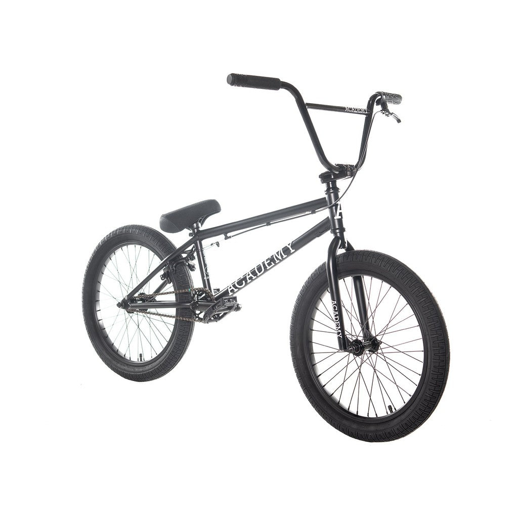 The Academy Aspire 20 Inch Bike, featuring a black freestyle design with a sturdy frame, wide tires, and CrMo bars enhanced by sealed hubs, sits against a white background.