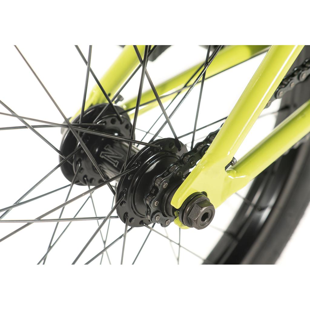 Close-up of the rear hub and spokes on a yellow Colony Rico Pro 20 Inch bike, highlighting the intricate details of this limited edition model.