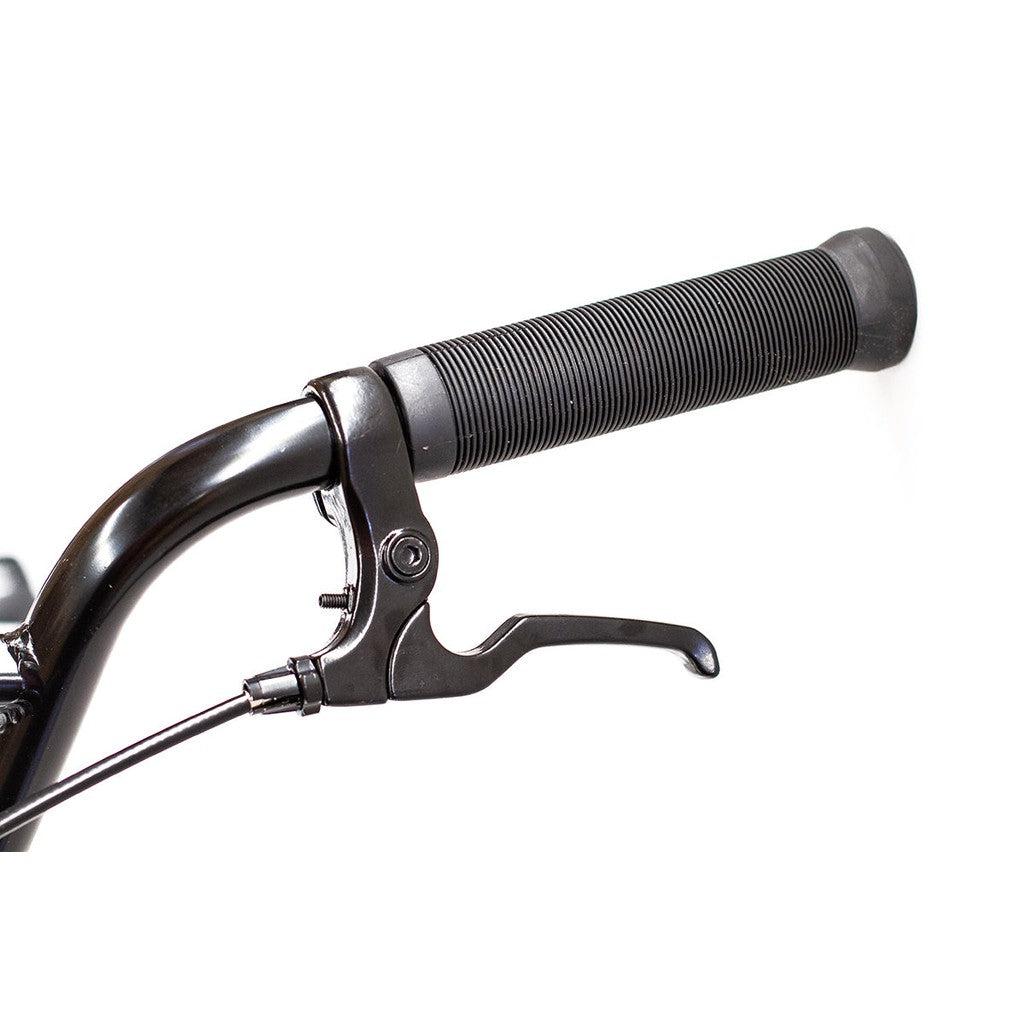 Close-up of the Division Fortiz 20 Inch Bike's handlebar, showcasing a black rubber grip and a metal brake lever affixed to its sturdy chromoly frame.