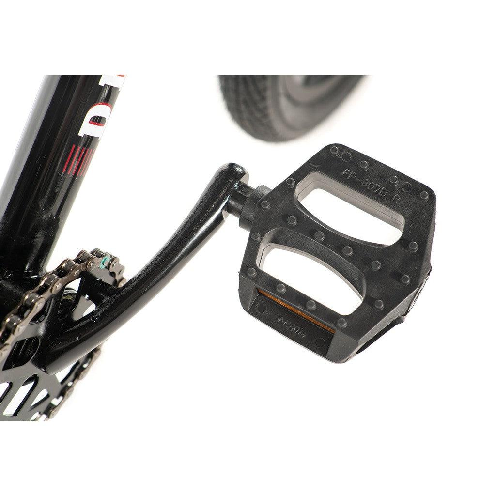 Close-up of a black bicycle pedal and crank arm attached to the Division Blitzer 14 Inch Bike's chainring and frame on a white background, highlighting an entry-level Freestyle BMX bike.