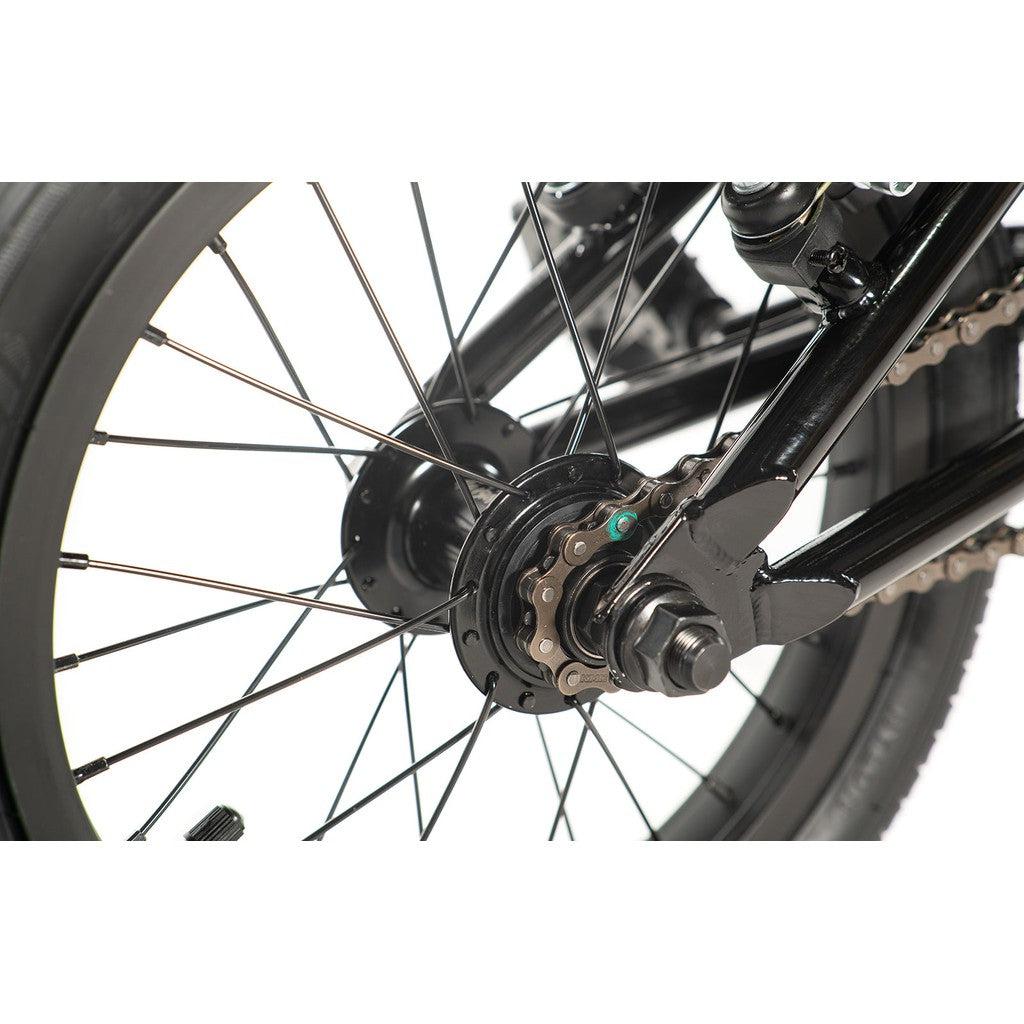 A close-up image of the back wheel of a Division Blitzer 14 Inch Bike highlights the spokes, hub, chain, and section of the tire set against a white background—ideal for beginners interested in Freestyle BMX biking.