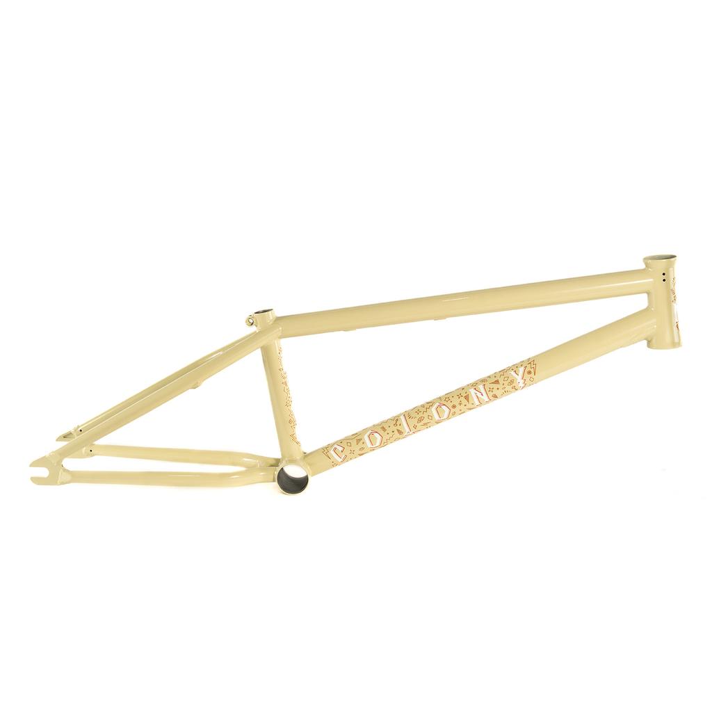 The Colony Rico 'Lite' Frame is a beige bicycle frame adorned with decorative floral patterns and the text "BOLT" on the lower tube.