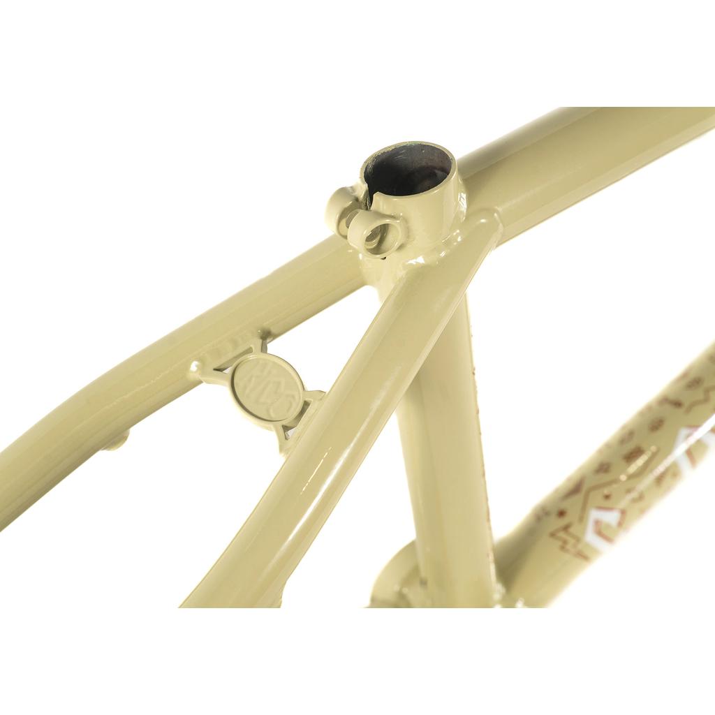 A close-up of the Colony Rico 'Lite' Frame shows its beige finish with decorative details and an engraved logo near the seat clamp.