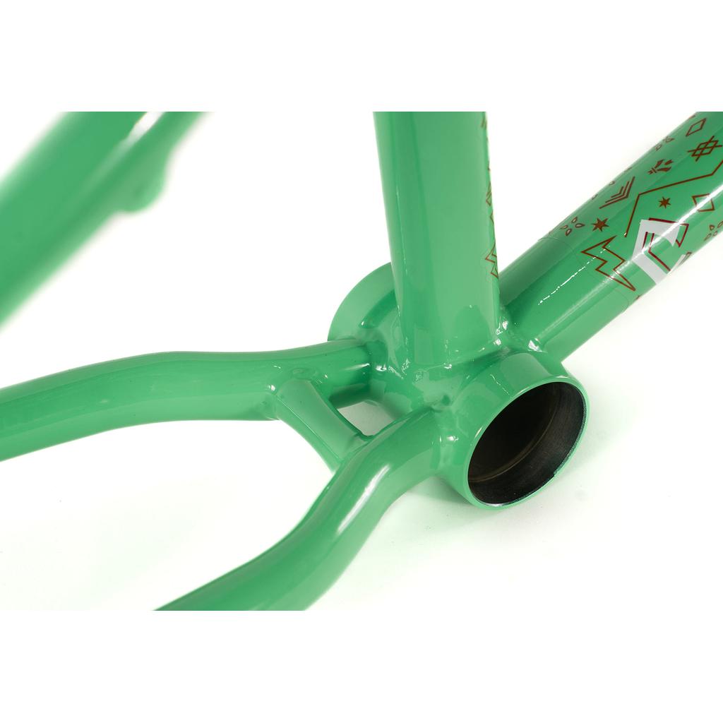 A close-up view of the Colony Rico 'Lite' Frame in green, featuring decorative patterns around the bottom bracket area.