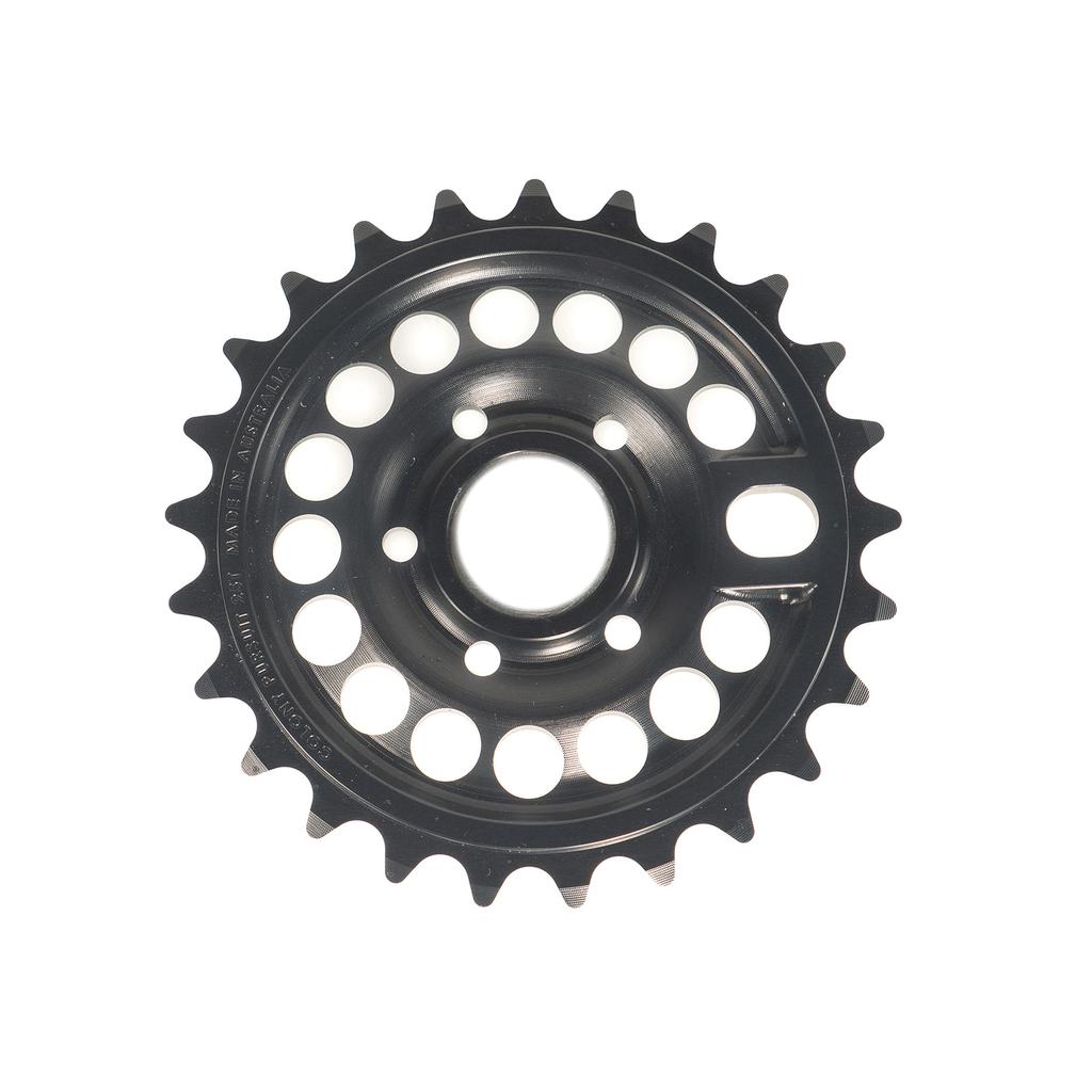 The black Colony Pursuit Sprocket is crafted from CNC-machined aluminum and features round inner holes with teeth on the edge, viewed from above.