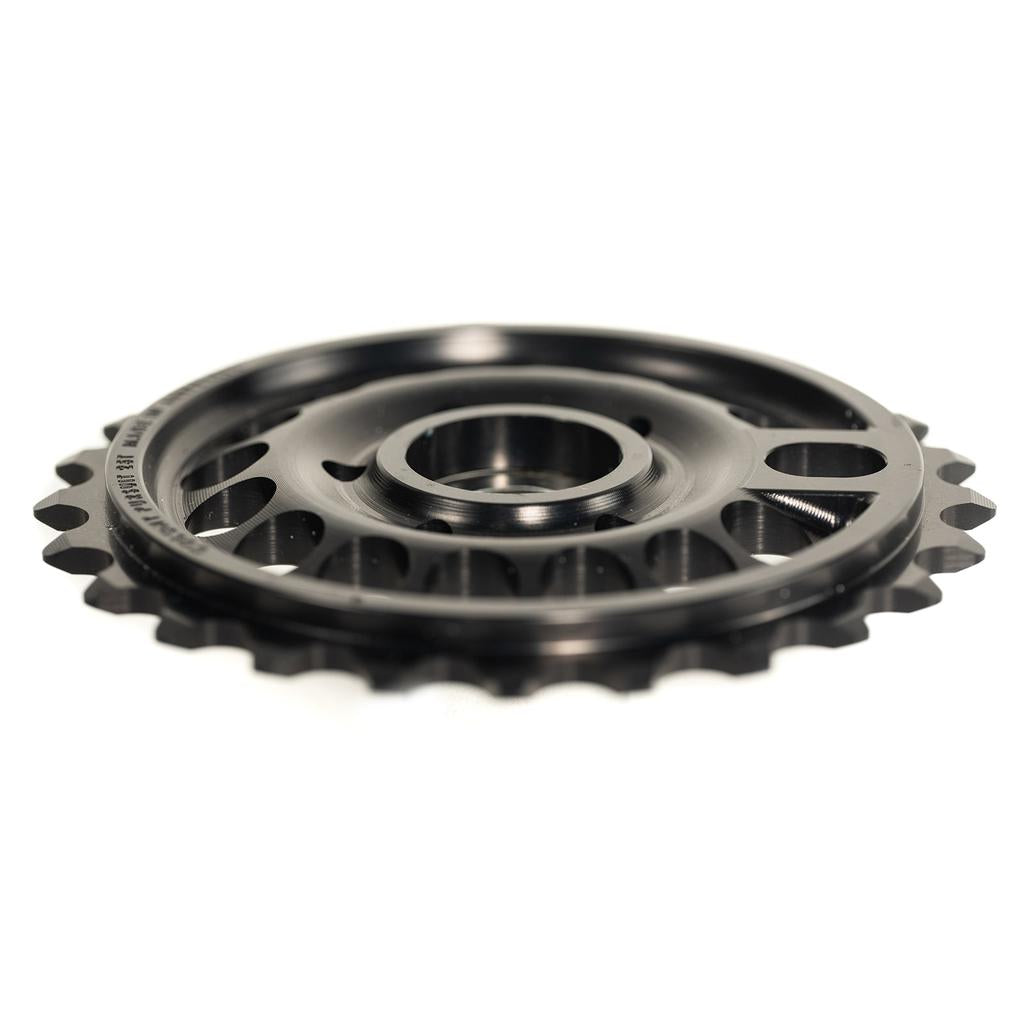 A close-up view of the Colony Pursuit Sprocket, made in Australia, highlights its precision CNC-machined aluminum frame with circular cutouts and sturdy teeth, ideal for gear components in bicycles.