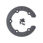 A grey, circular Odyssey Utility Sprocket Guard featuring the word "ODYSSEY" engraved on it with five screws arranged in the center.