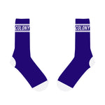 Colony BMX Logo Socks are a pair of blue socks with white toes and heels, emblazoned with the word "COLONY" in bold white on each cuff. These socks are a tribute to Colony BMX, designed with durability and style in mind, proudly made in Australia.