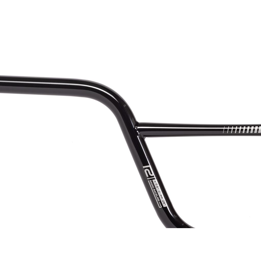 Close-up of a Radio Raceline Neon Pro handlebar with a sleek design and smooth finish, featuring a small logo and precise measurement markings.