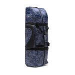 A blue and black camo-patterned DK Golf Flight Bike Bag with a vertical zipper and side handles stands upright.