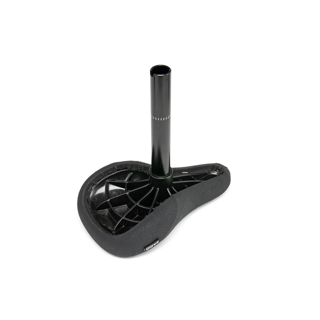 The Radio Century Combo Seat features a durable black padded cover and attached metal post. The photo captures the seat's underside structure from below.