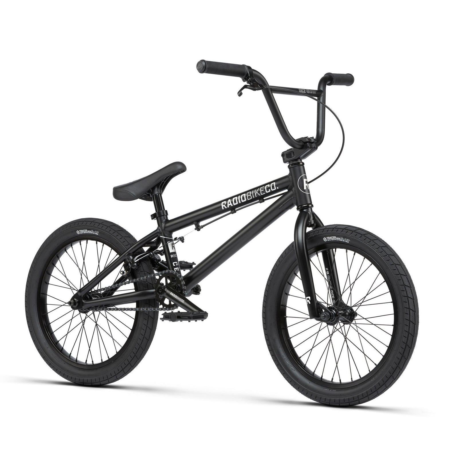 Black Radio Dice 18 Inch Bike with Radio Bike Co. branding, featuring thick Salt Tracer Tyres, three-piece cranks, straight handlebars, and a compact frame designed for stunt riding.