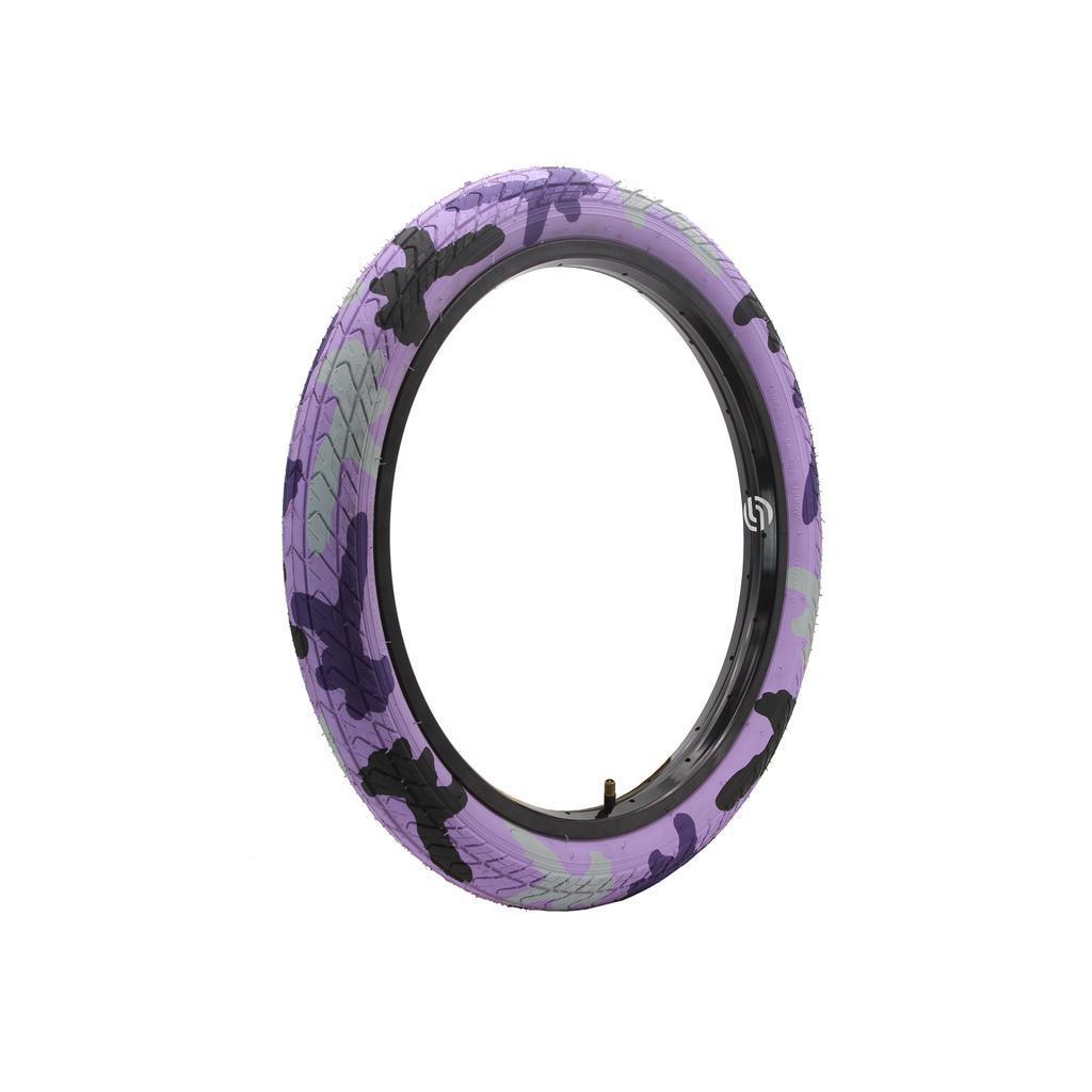 The DRS Arrow FS 20 Inch Tyre, featuring a purple and black camouflage pattern, is displayed upright against a white background.