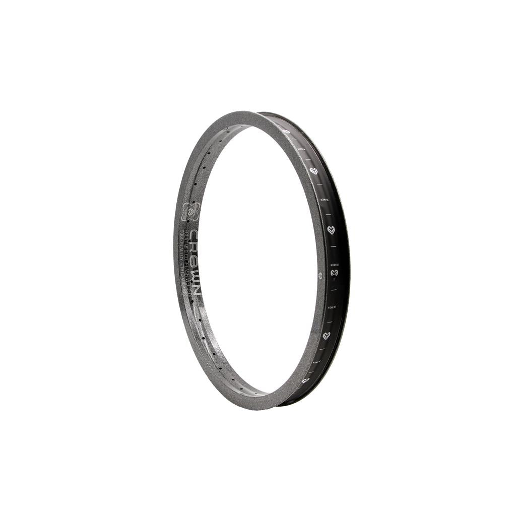 The Eclat Crown Rim is a circular black metal ring made from 6066-T6 alloy, adorned with small engraved symbols that add a touch of mystery and style.