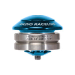 A blue and silver bicycle headset labeled "Radio Raceline 1-Inch Integrated Headset" features specifications "TH INDUSTRIES 1” ACB 36°x45° 373#" and boasts high-precision bearings for smooth performance.